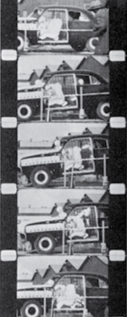 Black and white photo roll of safety belt in tests