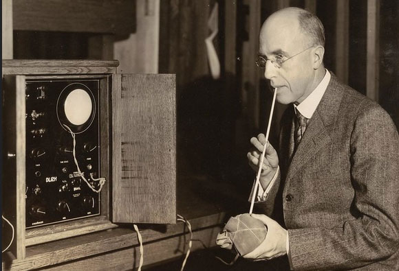 Frederick Bedell demonstrates parts of his electric elevator