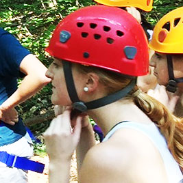 student in riding helmet